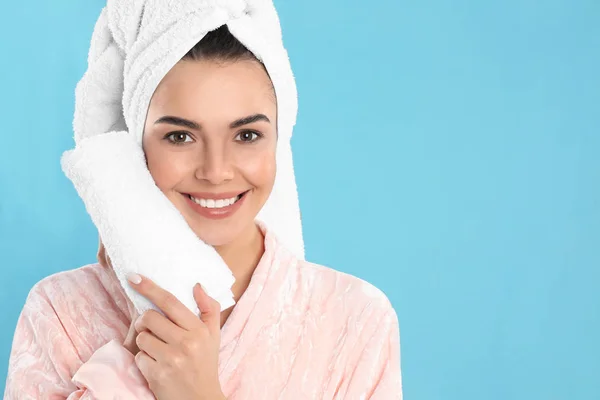 Young Woman Wiping Face Towel Light Blue Background Space Text — Stok fotoğraf