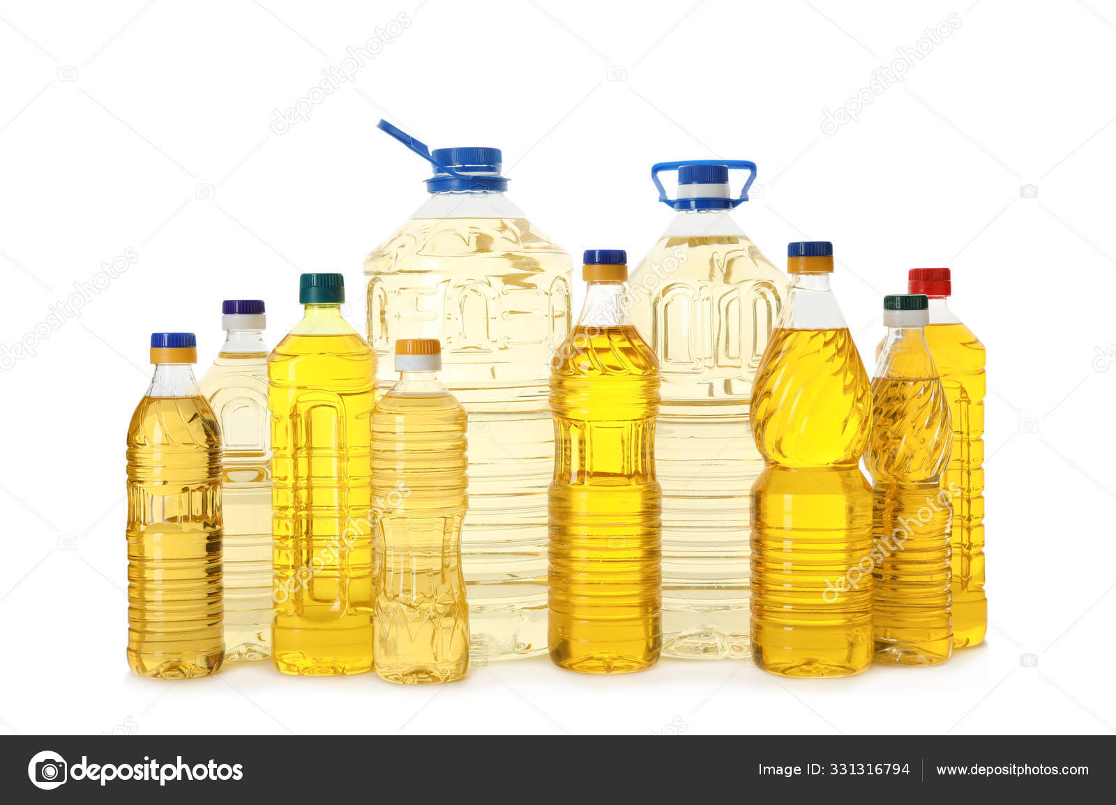 Cooking Oil In Different Bottles Isolated On White Stock Photo By cooking-oil-in-different-bottles-isolated-on-white-stock-photo-by