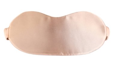 Beige sleeping mask isolated on white. Bedtime accessory clipart