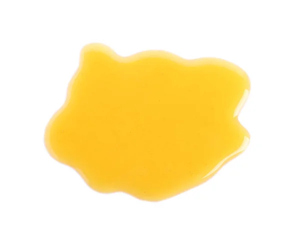 Пролитой свежий сладкий мед изолирован от белого — стоковое фото