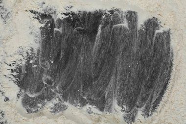 Koyu arkaplanda unla yapılmış çerçeve, üst manzara. Metin için boşluk