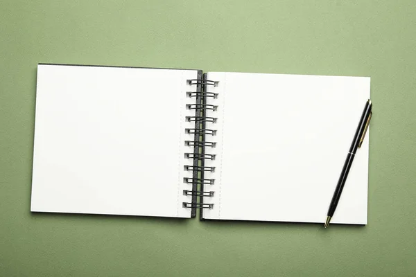 Stylish Open Notebook Pen Green Background Top View — 스톡 사진