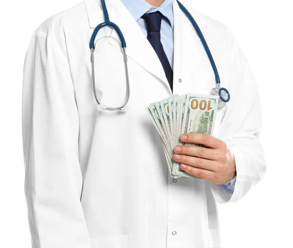 Arzt mit Bestechungsgeld auf weißem Hintergrund, Nahaufnahme. Korruption in mir — Stockfoto