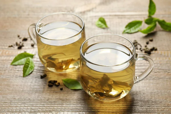 Cups Green Tea Dry Fresh Leaves Wooden Table — Stock Photo, Image