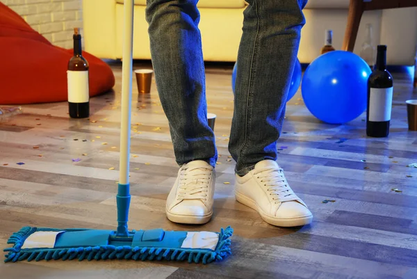 Young Man Mop Cleaning Messy Room Party Closeup Legs — Stock Photo, Image
