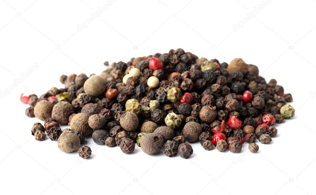 Mix of different pepper grains isolated on white