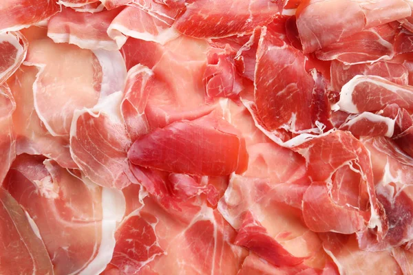 Lezzetli Prosciutto Dilimleri Arkaplan Olarak Üst Görünüm — Stok fotoğraf