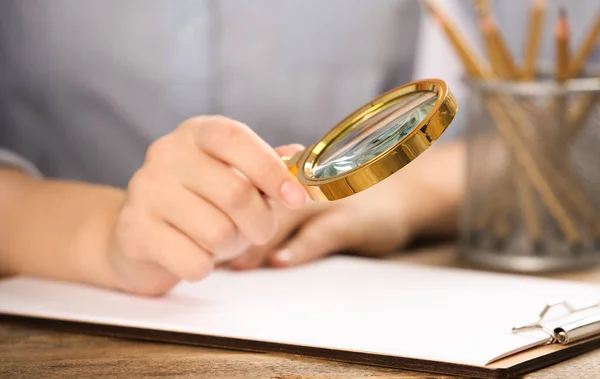 Woman Using Magnifying Glass Table Closeup — 스톡 사진