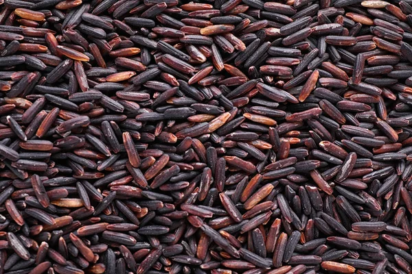 Keittämätön Orgaaninen Ruskea Riisi Taustana Ylhäältä — kuvapankkivalokuva