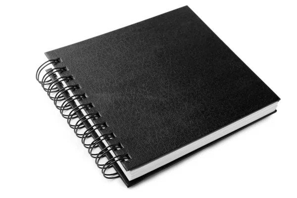 Stylový černý spirálový notebook izolovaný na bílé — Stock fotografie