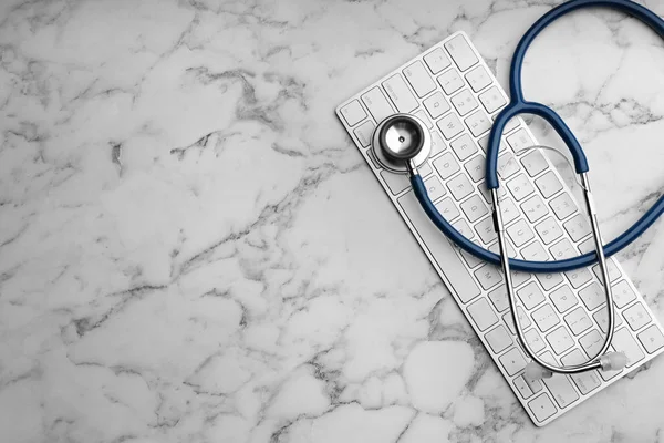 Keyboard Stethoscope White Marble Table Flat Lay Space Text Concept — Stock Photo, Image