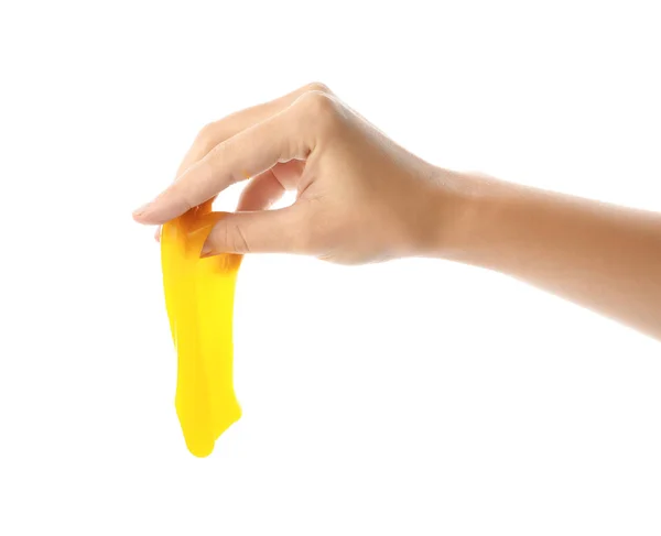 Mujer jugando con limo amarillo aislado en blanco, primer plano. Anti — Foto de Stock