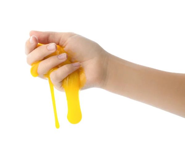 Woman playing with yellow slime isolated on white, closeup. Anti — 스톡 사진