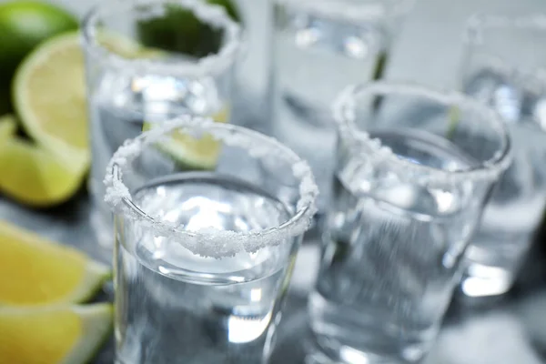 Mexican Tequila Shots Lime Slices Salt Grey Table Closeup — Stock Photo, Image