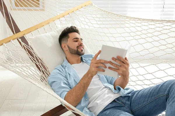 Young Man Reading Book Hammock Home — 스톡 사진