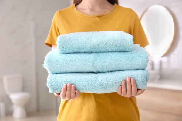 Woman Holding Stack Fresh Towels Indoors Closeup — Stock Photo, Image