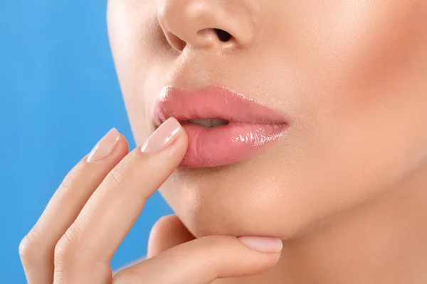 Young Woman Beautiful Full Lips Light Blue Background Closeup — 스톡 사진