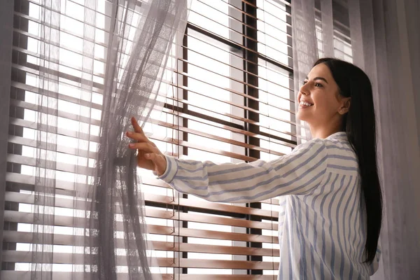 Woman Opening Window Curtain Home Morning — Stock Photo, Image