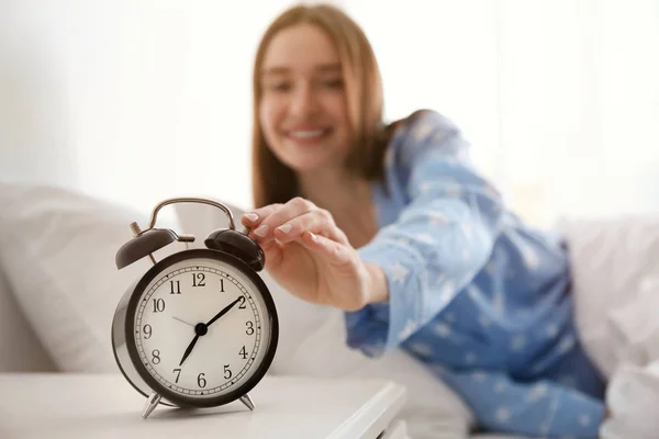 Young Woman Turning Alarm Clock Home Morning Focus Hand — Stock Photo, Image