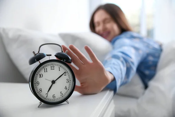 Young Woman Turning Alarm Clock Home Morning Focus Hand — Stock Photo, Image