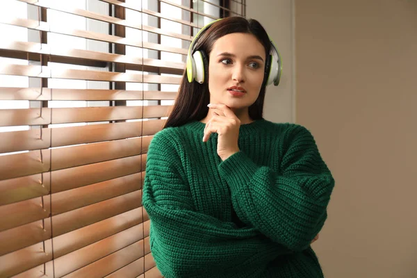 Young Woman Listening Audiobook Window Indoors — 스톡 사진