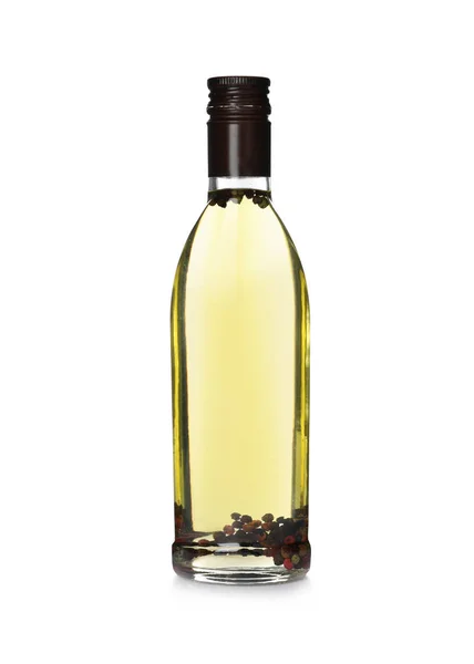 Кулінарна олія з перцем у скляній пляшці ізольовані на білому — стокове фото