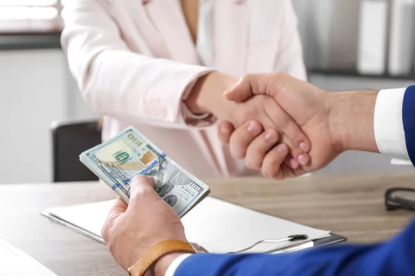 Man Shaking Hands Woman Offering Bribe Table Closeup — 스톡 사진