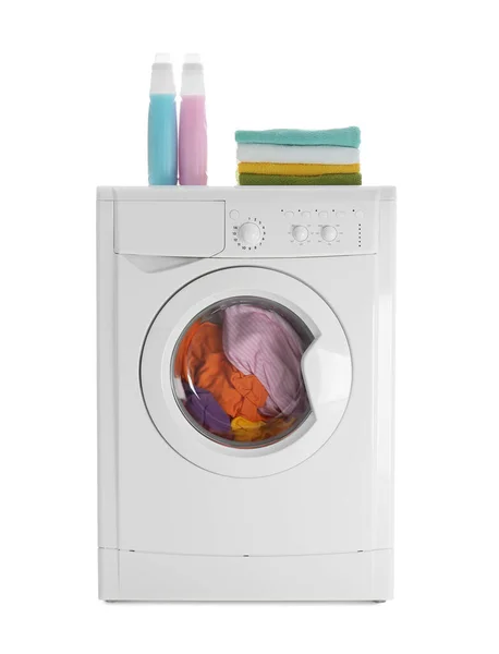 Modern washing machine with laundry, stack of towels and deterge — Stock Photo, Image