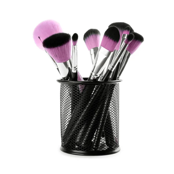 Set de cepillos de maquillaje profesional en soporte aislado en blanco — Foto de Stock
