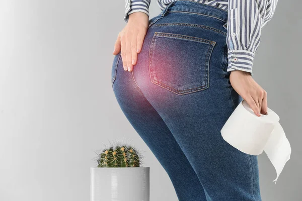 Woman Toilet Paper Sitting Cactus Light Grey Background Closeup Hemorrhoid — Stock Photo, Image