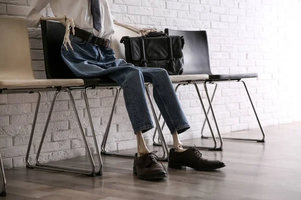 Human Skeleton Office Wear Sitting Chair Brick Wall Indoors Closeup — 스톡 사진