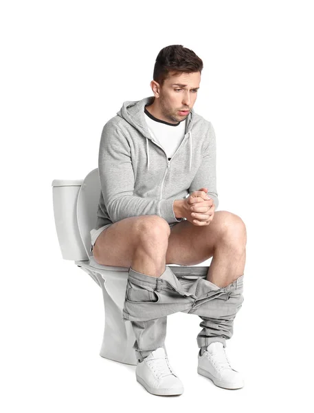 Homem Emocional Sentado Vaso Sanitário Fundo Branco — Fotografia de Stock