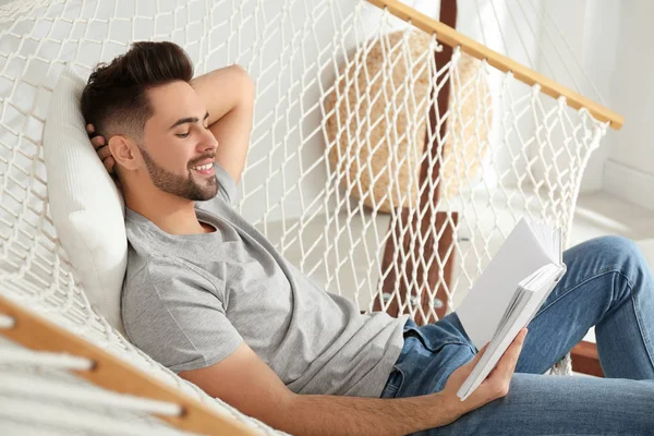 Young Man Reading Book Hammock Home — Stock Photo, Image