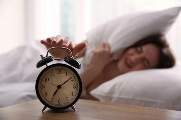 Young Woman Turning Alarm Clock Home Morning Focus Hand — Stock Photo, Image