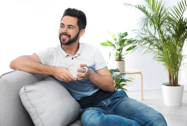 Young Man Cup Drink Relaxing Couch Home — 스톡 사진
