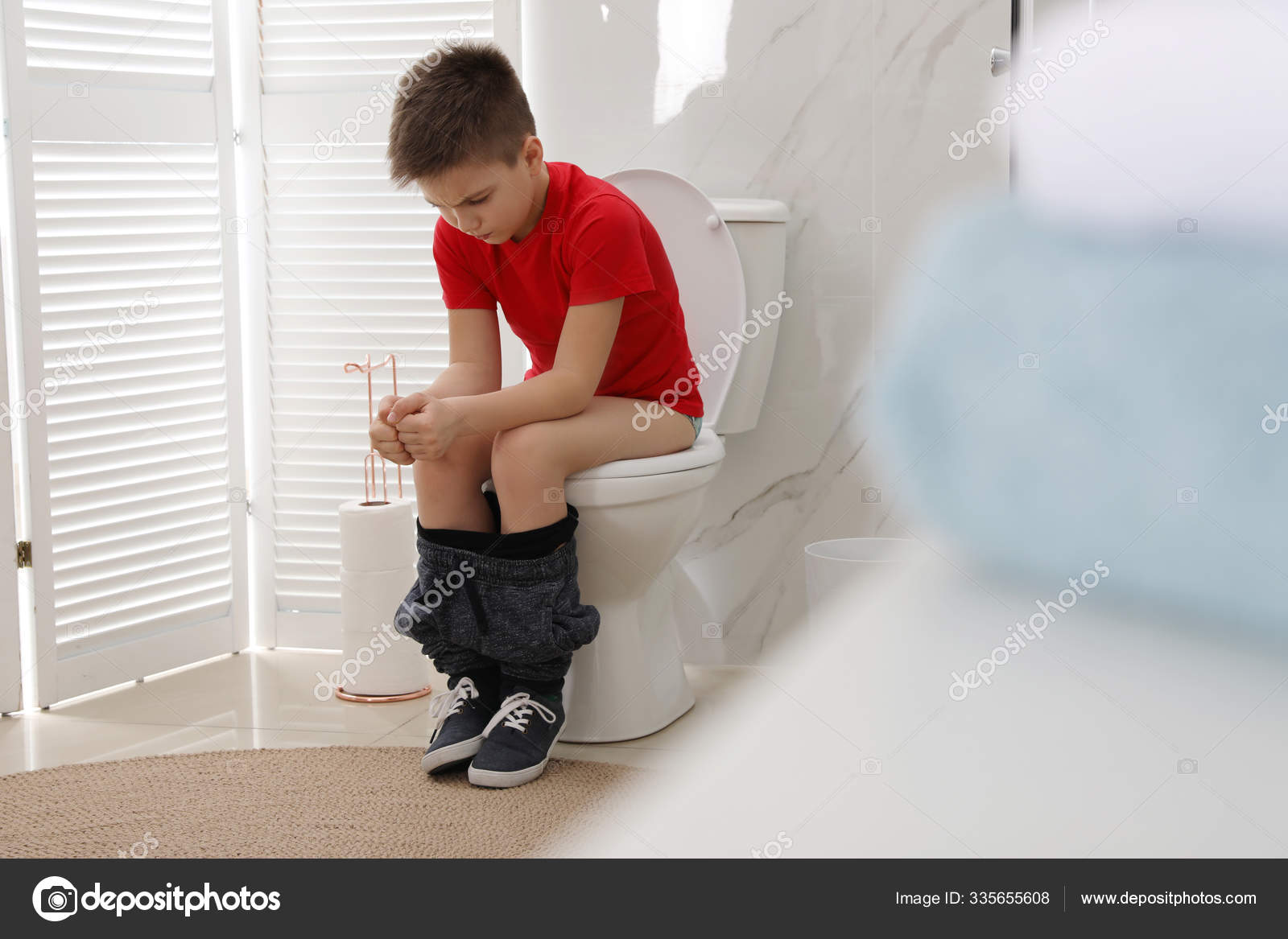 Boy Suffering Hemorrhoid Toilet Bowl Rest Room Stock Photo by