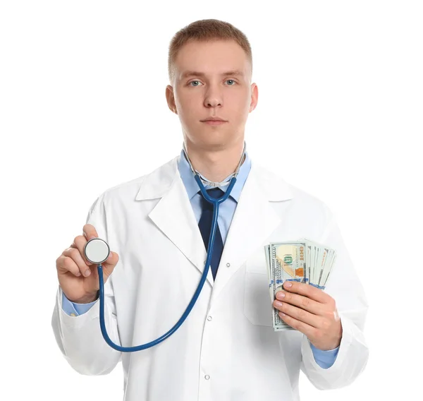 Dokter met steekpenningen en stethoscoop op witte achtergrond. Corruptio — Stockfoto