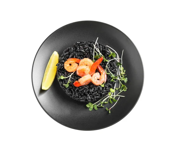 Délicieux risotto noir aux crevettes et citron isolé sur blanc — Photo