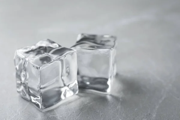 Crystal Clear Ice Cubes Grey Table Closeup — Stock Photo, Image