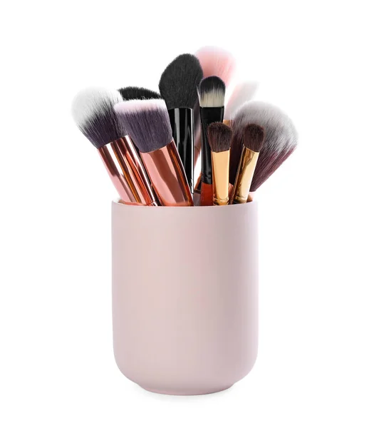 Set of professional makeup brushes in holder isolated on white — 스톡 사진