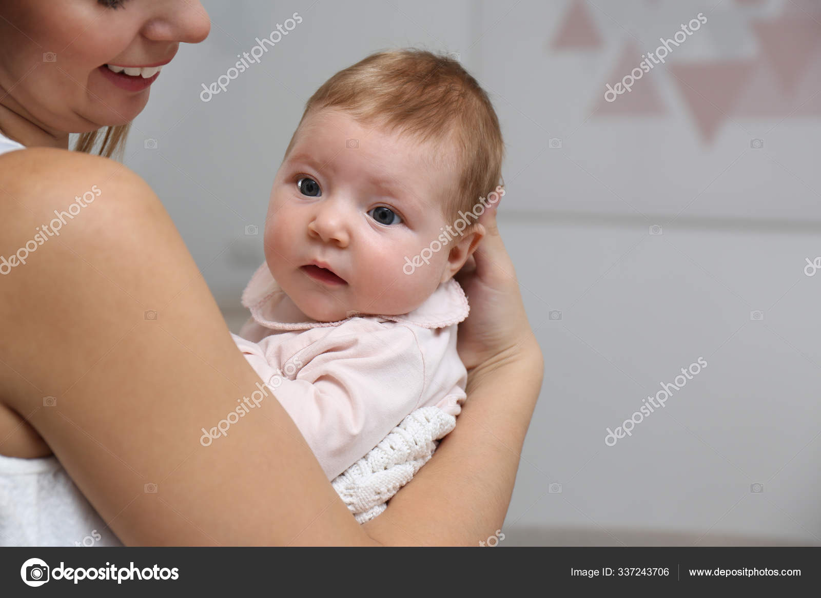 Mother is breast-feeding a newborn baby. Little baby girl breast feeding  Stock Photo