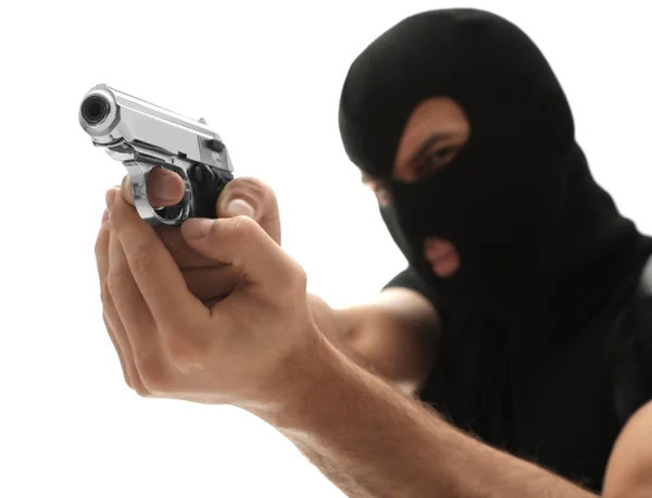 Professionell mördare med pistol på vit bakgrund — Stockfoto