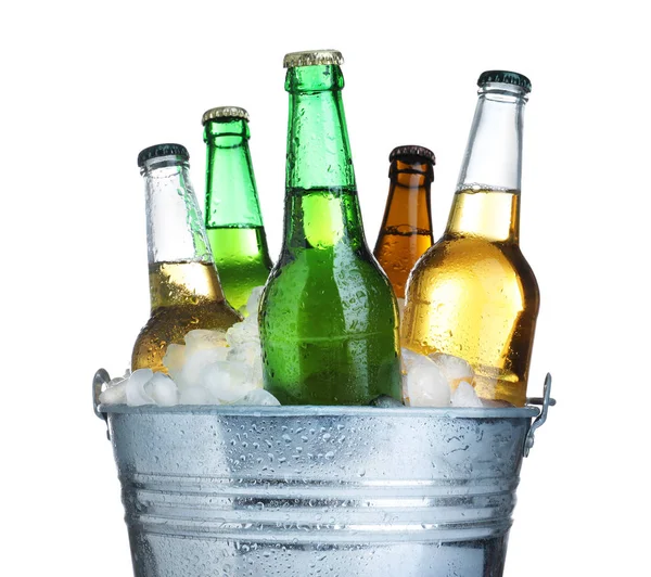 Beer in metal bucket with ice isolated on white — Stock Photo, Image
