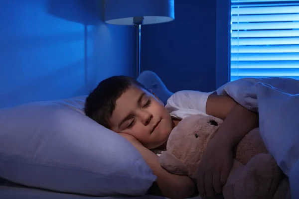 Little boy sleeping with teddy bear at home. Bedtime — 스톡 사진