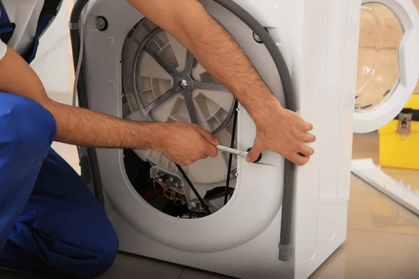 Professional Plumber Repairing Broken Washing Machine Closeup — Stock Photo, Image