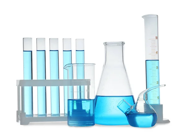Vidros Laboratório Diferentes Com Líquido Azul Claro Isolado Branco — Fotografia de Stock