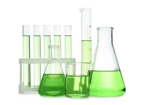 Different Laboratory Glassware Light Green Liquid Isolated White — Stock Photo, Image