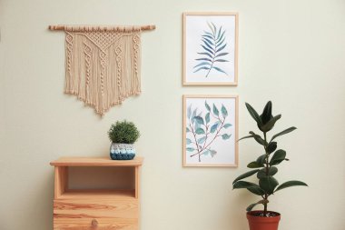 Stylish room interior design with floral paintings