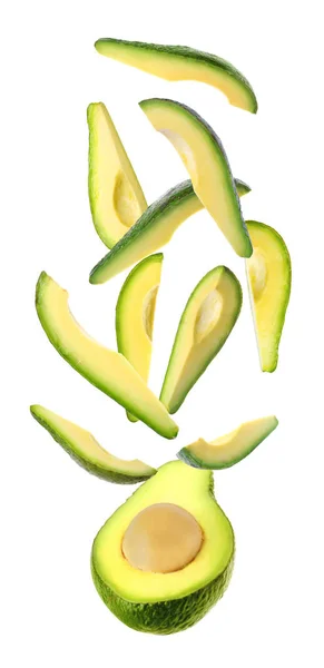 Flying Delicious Fresh Avocados White Background — 图库照片