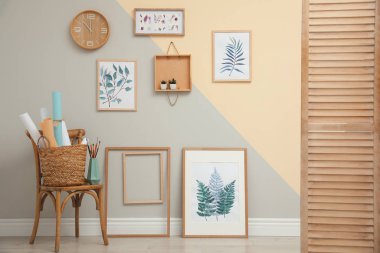 Stylish room interior design with floral paintings
